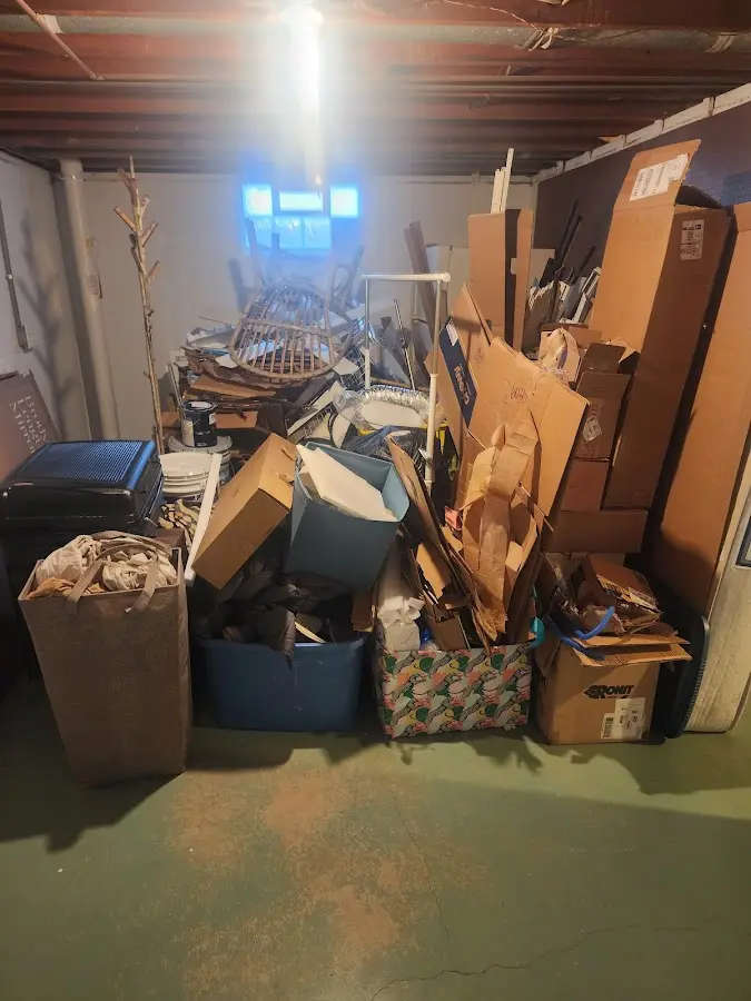 Roll-off dumpster container at job site for 2 Yard Dumpster Rental in Boone